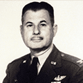 A black and white photo of an older man in uniform.