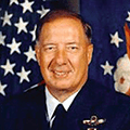 A man in uniform with an airplane on his chest.