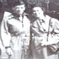 Two men in uniform standing next to each other.