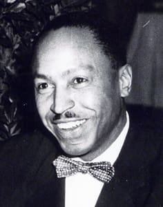 A black and white photo of an african american man.